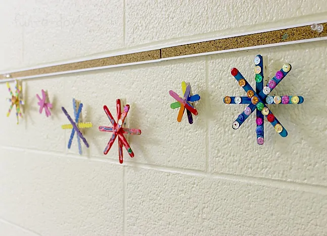 Snow Crafts For Toddlers - Colorful Popsicle Stick Snowflakes